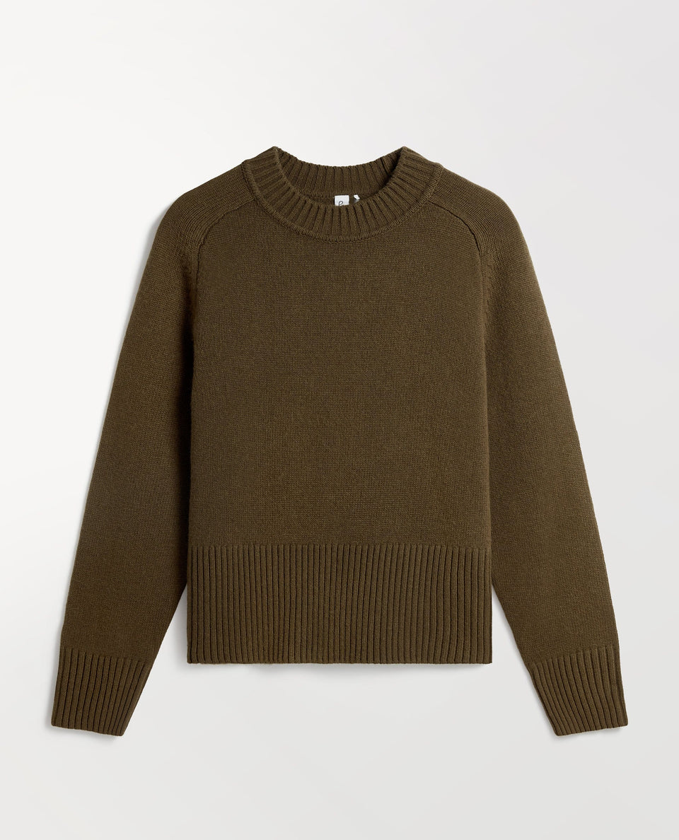 Image 2 of 5 showing Rise & Fall's military green cashmere merino saddle sleeve crew neck jumper.
