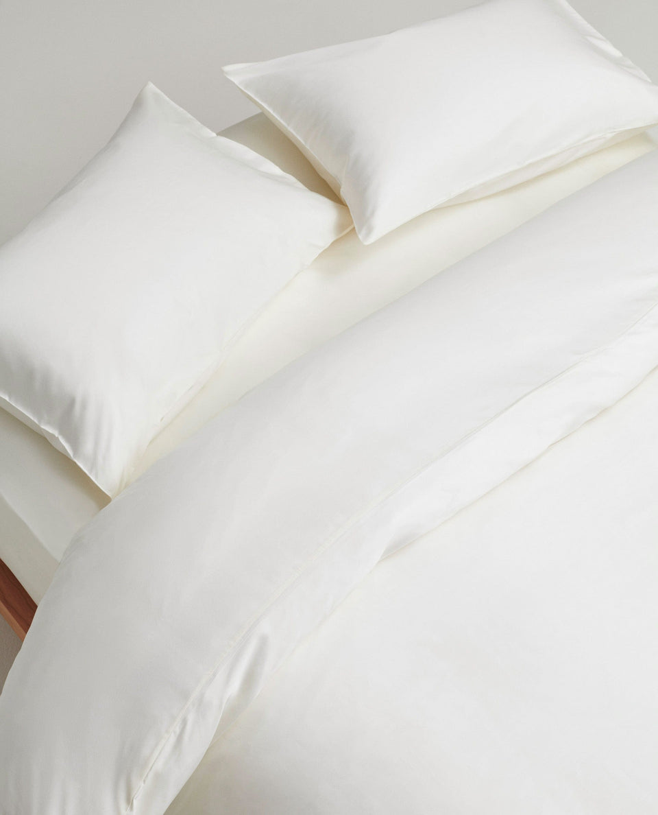 Image 2 of 6 showing Rise & Fall's Crisp & Cool Organic Cotton Standard Pillowcase Set, colour: buttermilk.