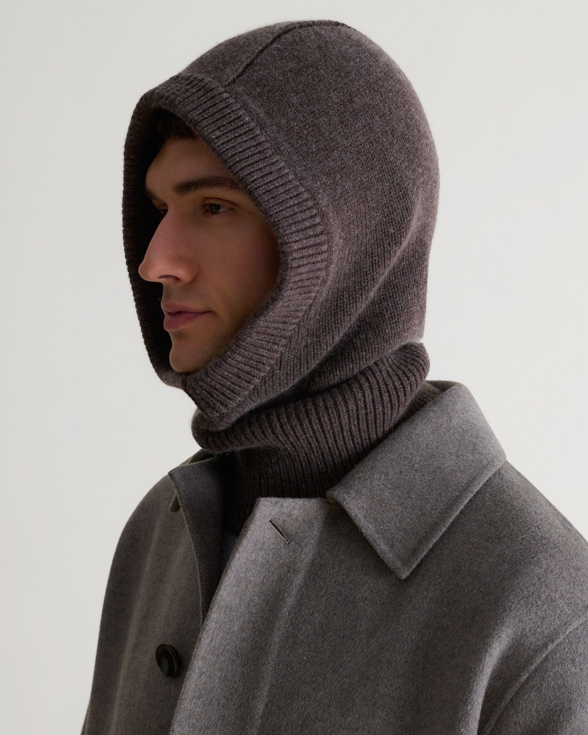 Image 3 of 3 showing man wearing Rise & Fall's chocolate brown Cashmere Merino Knitted Hood.