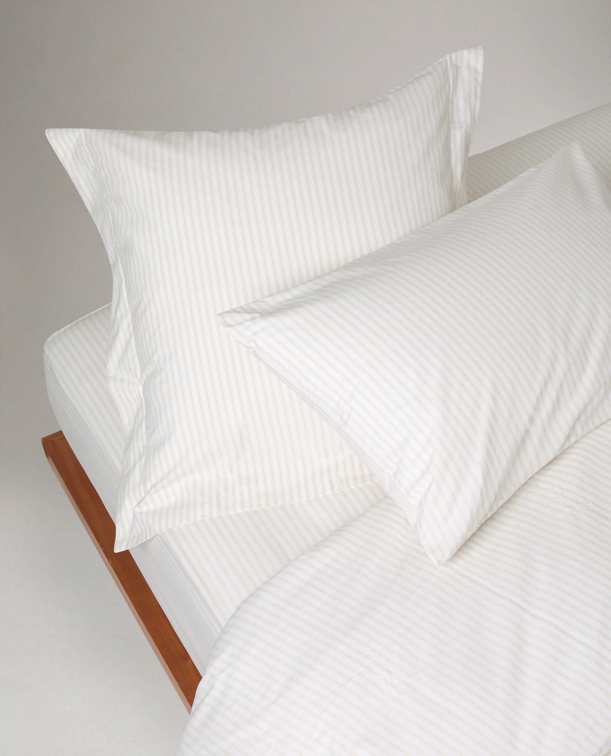 Image 3 of 3 showing Rise & Fall's Crisp & Cool Organic Cotton Pillowcases Set, colour: Buttermilk Ticking Stripe.