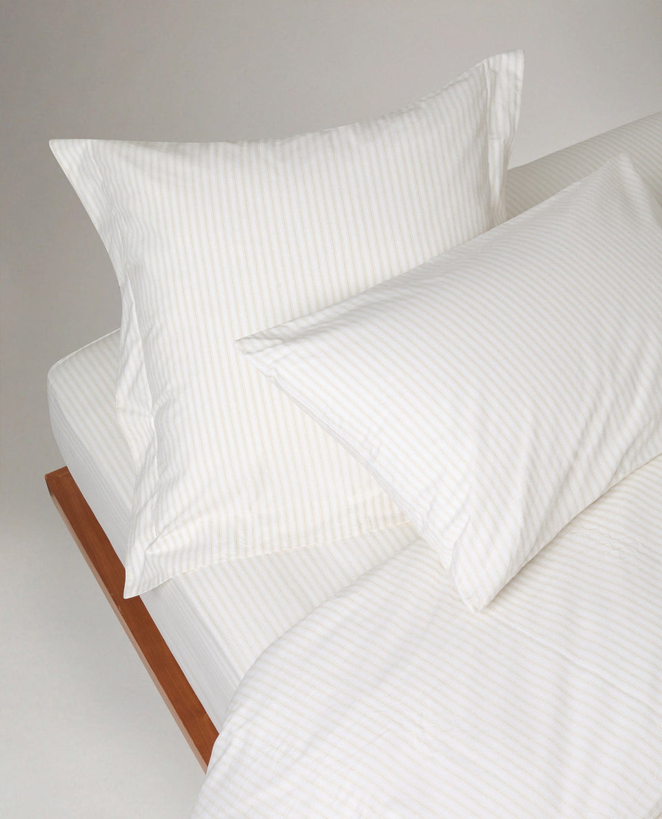 Image 3 of 3 showing Rise & Fall's Crisp & Cool Organic Cotton Pillowcases Set, colour: Buttermilk Ticking Stripe.