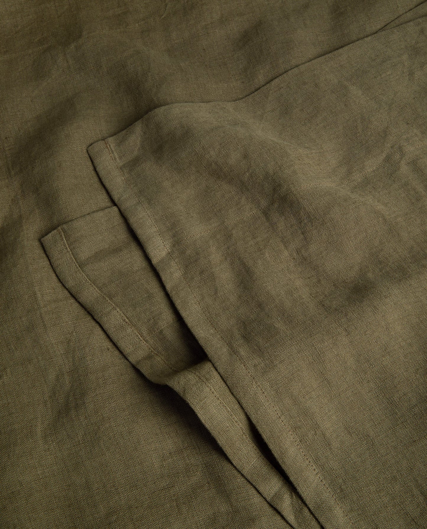 Image 3 of 3 showing Rise & Fall's Relaxed & Refined linen flat bed sheet in olive.