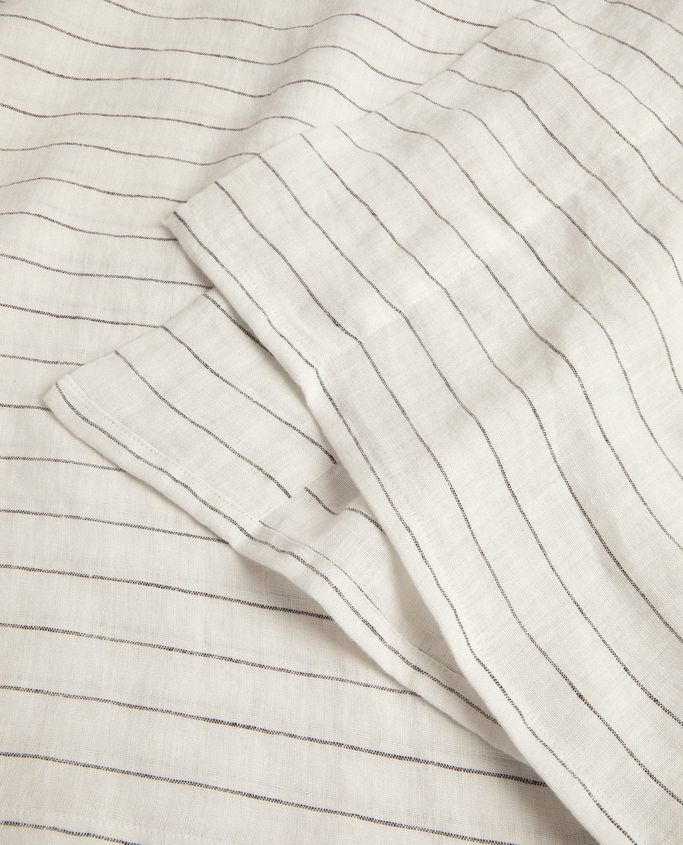 Image 3 of 3 showing Rise & Fall's Relaxed & Refined linen flat bed sheet in stripe.