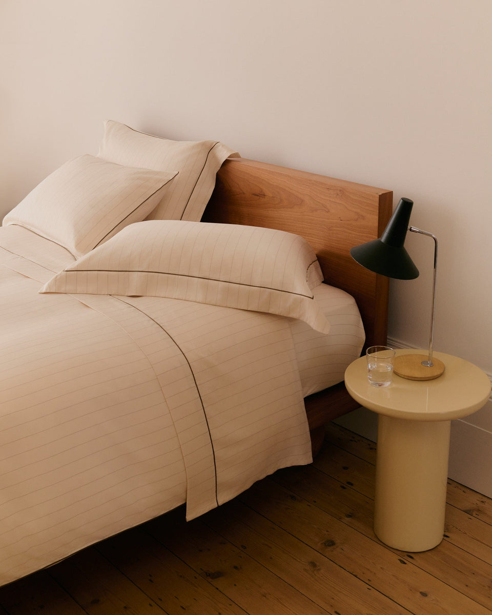 image 3 of 3 showing Rise & Fall's buttermilk stripe Soft & Smooth sateen cotton duvet set with olive velvet cushion