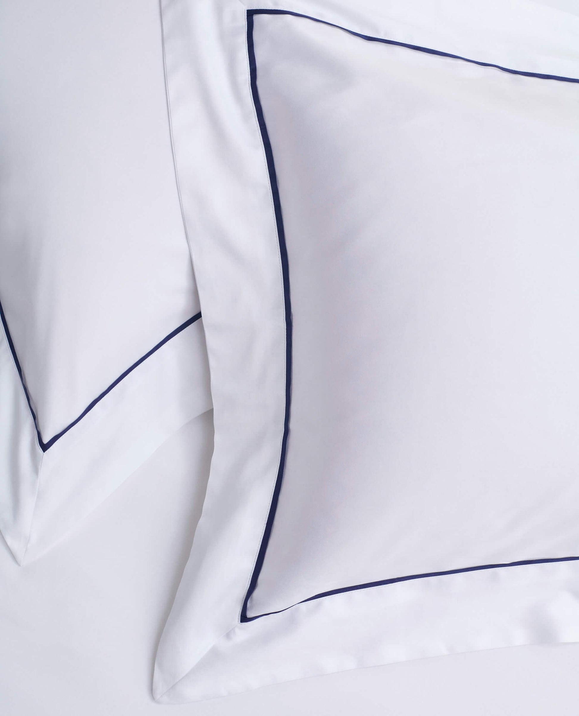 Image 3 of 4 showing Rise & Fall's Crisp & Cool Organic Cotton Oxford Pillowcase Set, colour: white navy piping.