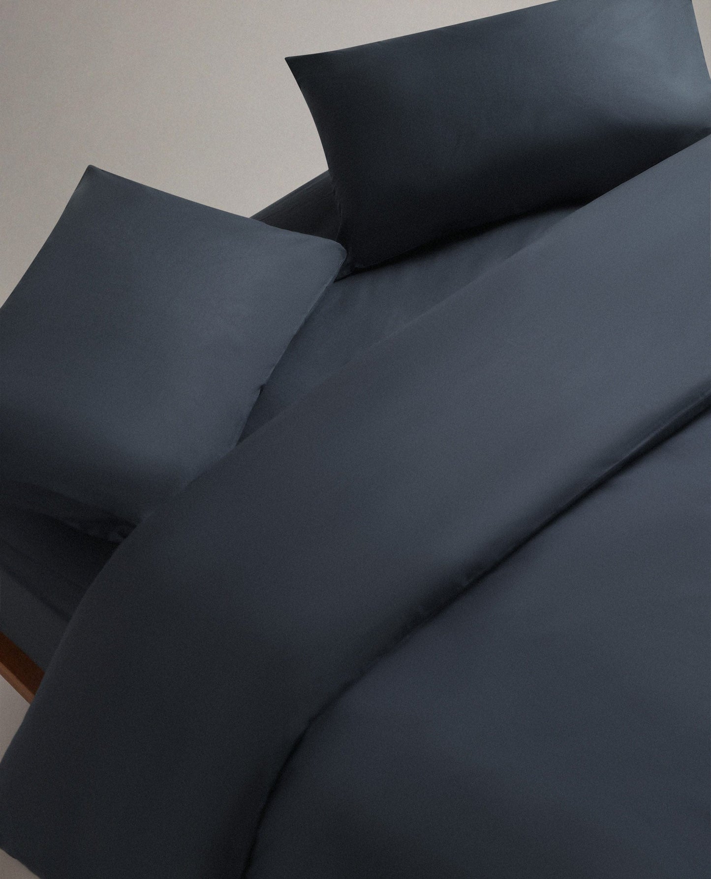 Image 3 of 4 showing Rise & Fall's sateen cotton duvet cover mood indigo.