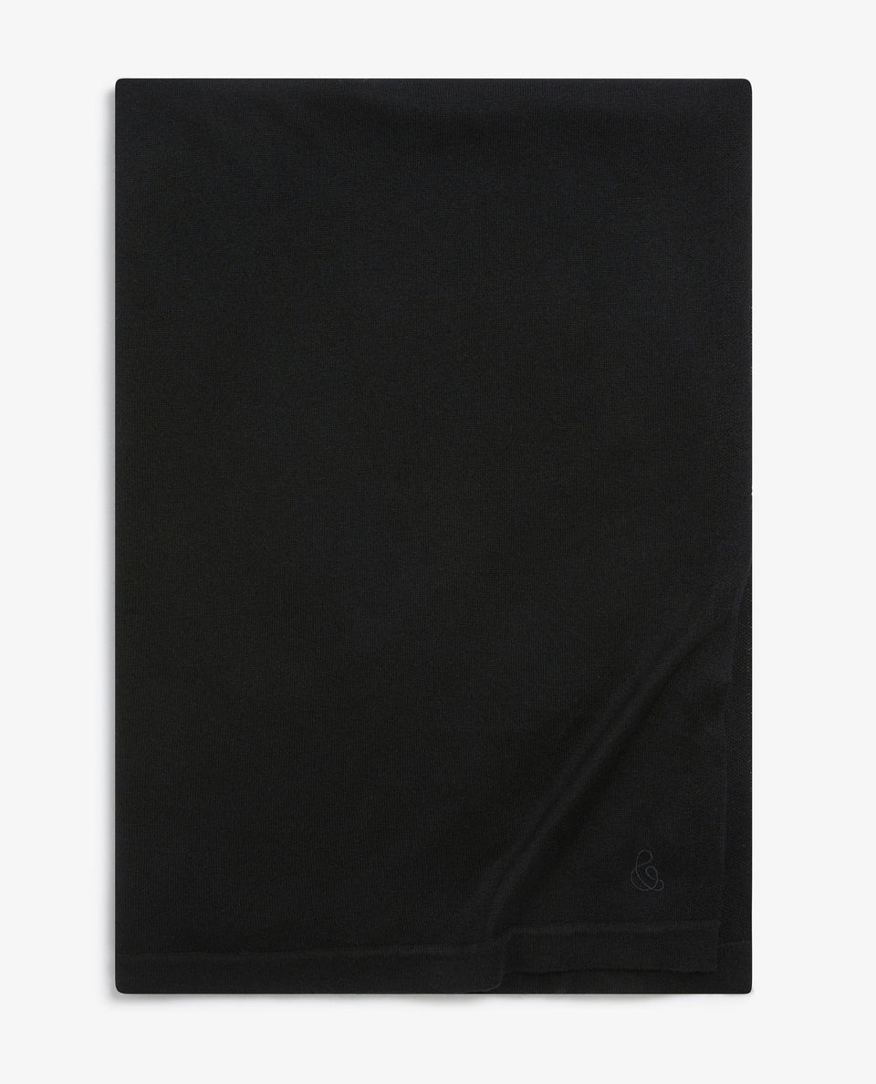 Image 3 of 5 showing Rise & Fall's black oversized cashmere scarf.