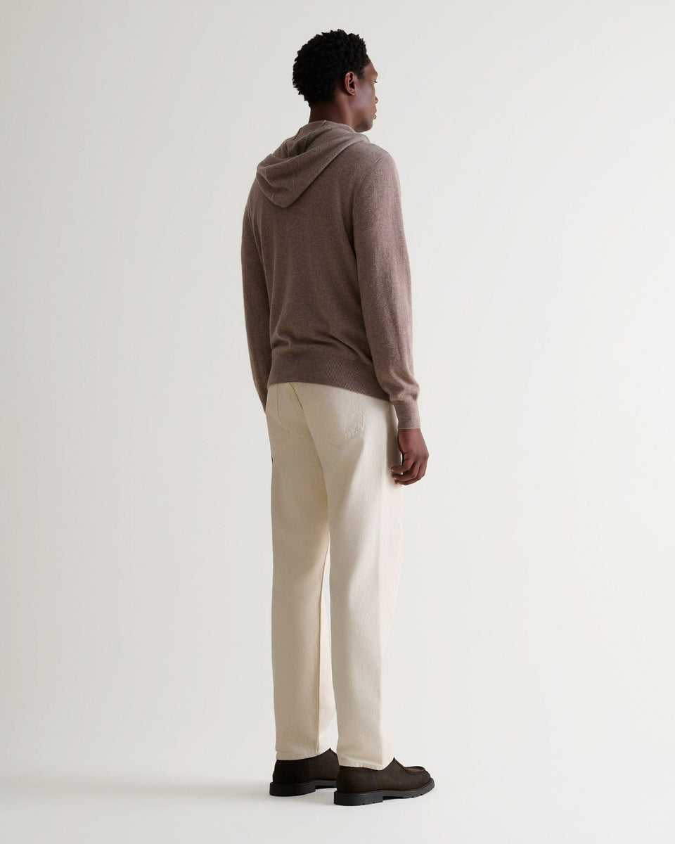 Image 3 of 5 showing man wearing Rise & Fall's fine cashmere zip hoodie, toast, back view.
