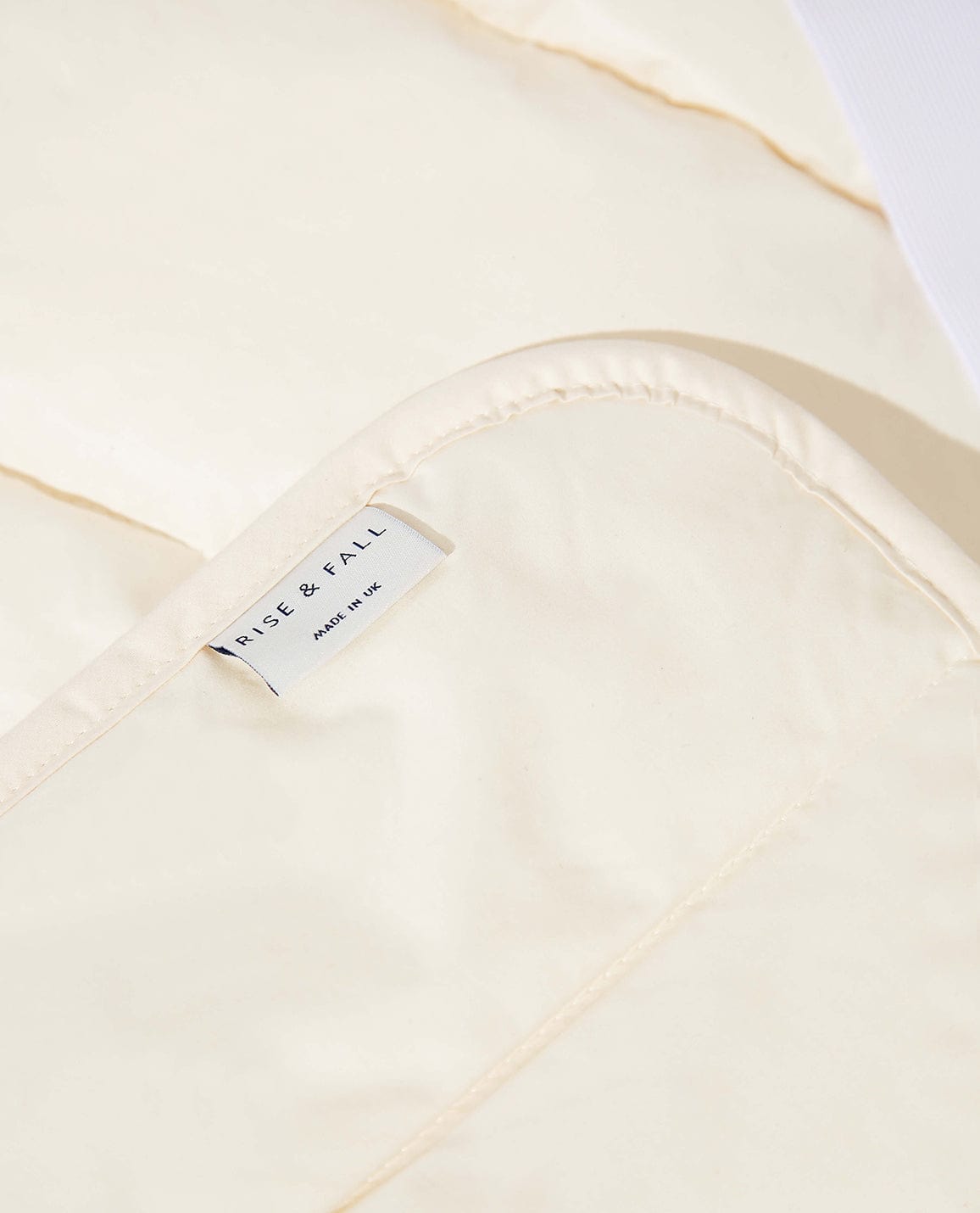 Image 3 of 5 showing Rise & Fall's certified British Wool Mattress Protector.