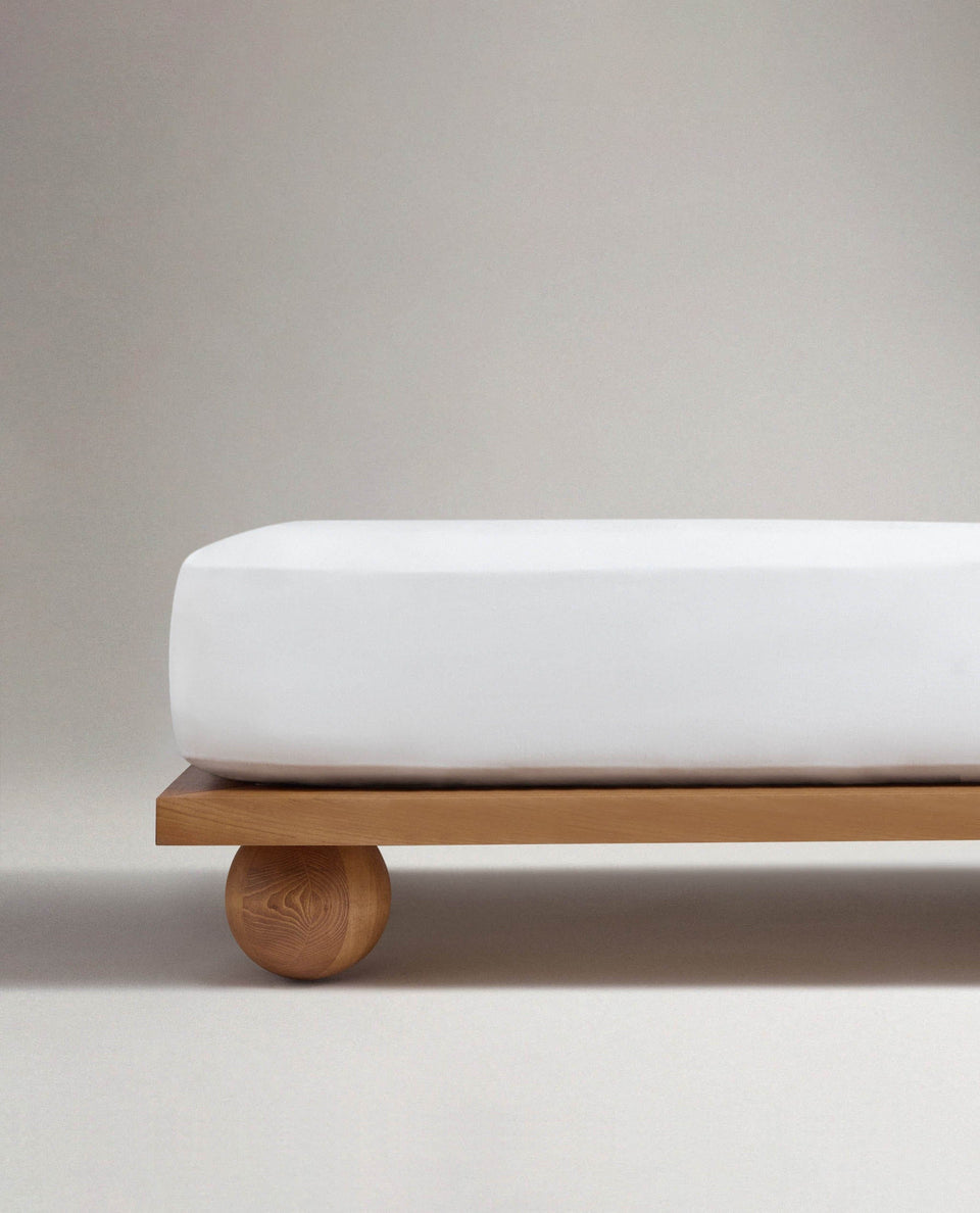 Image 3 of 5 showing Rise & Fall's Relaxed & Refined European flax™ linen fitted sheet in white.