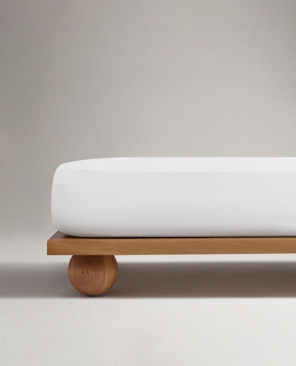 Image 3 of 6 showing Rise & Fall's Crisp & Cool organic cotton fitted sheet in white.