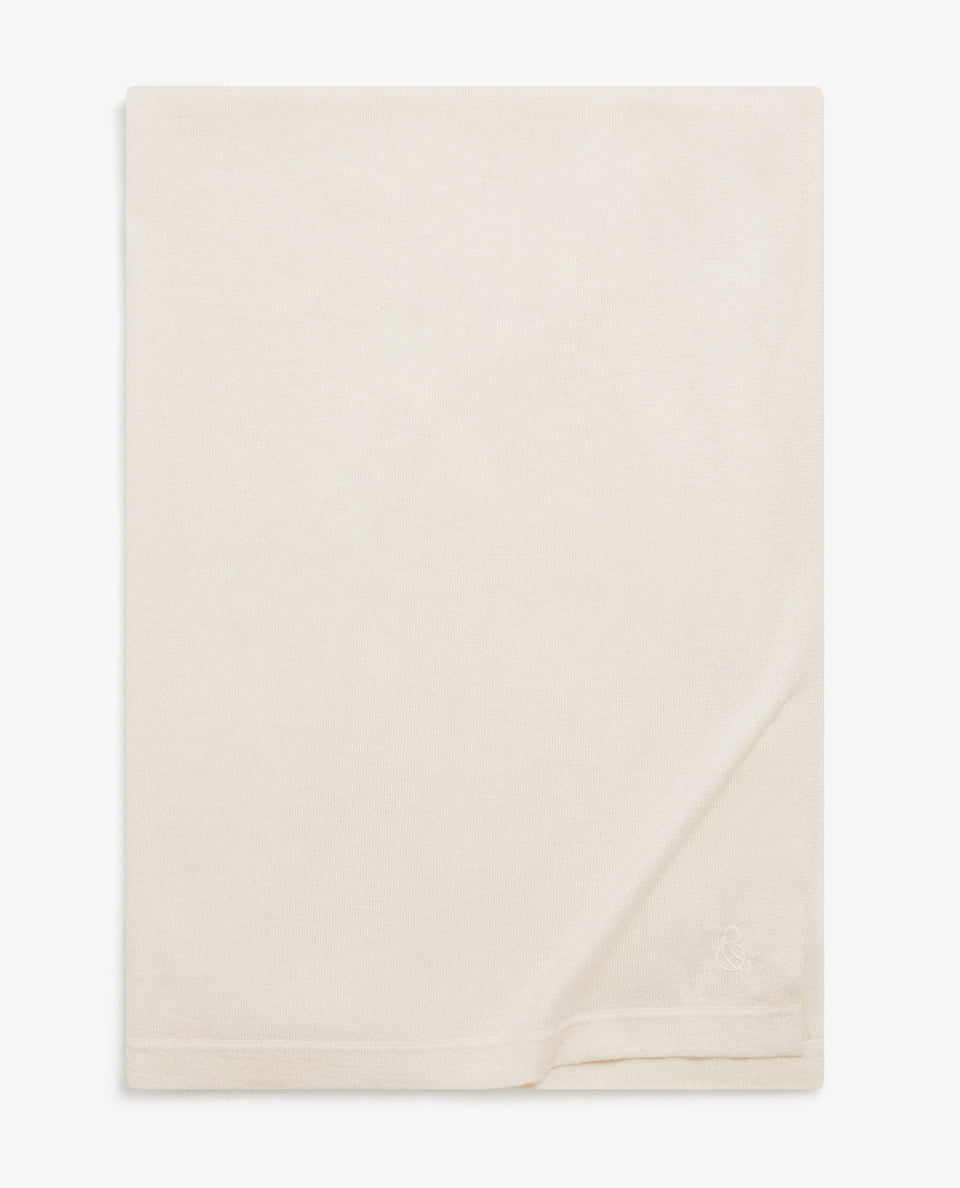Image 4 of 4 showing Rise & Fall's oversized cashmere scarf in buttermilk.