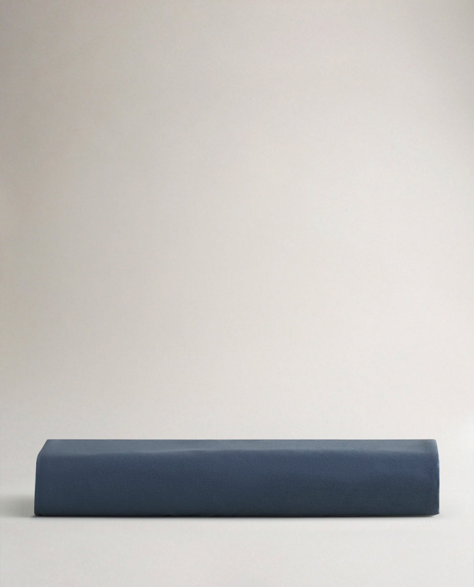Image 4 of 4 showing Rise & Fall's Soft & Smooth organic sateen cotton flat sheet in mood indigo. 
