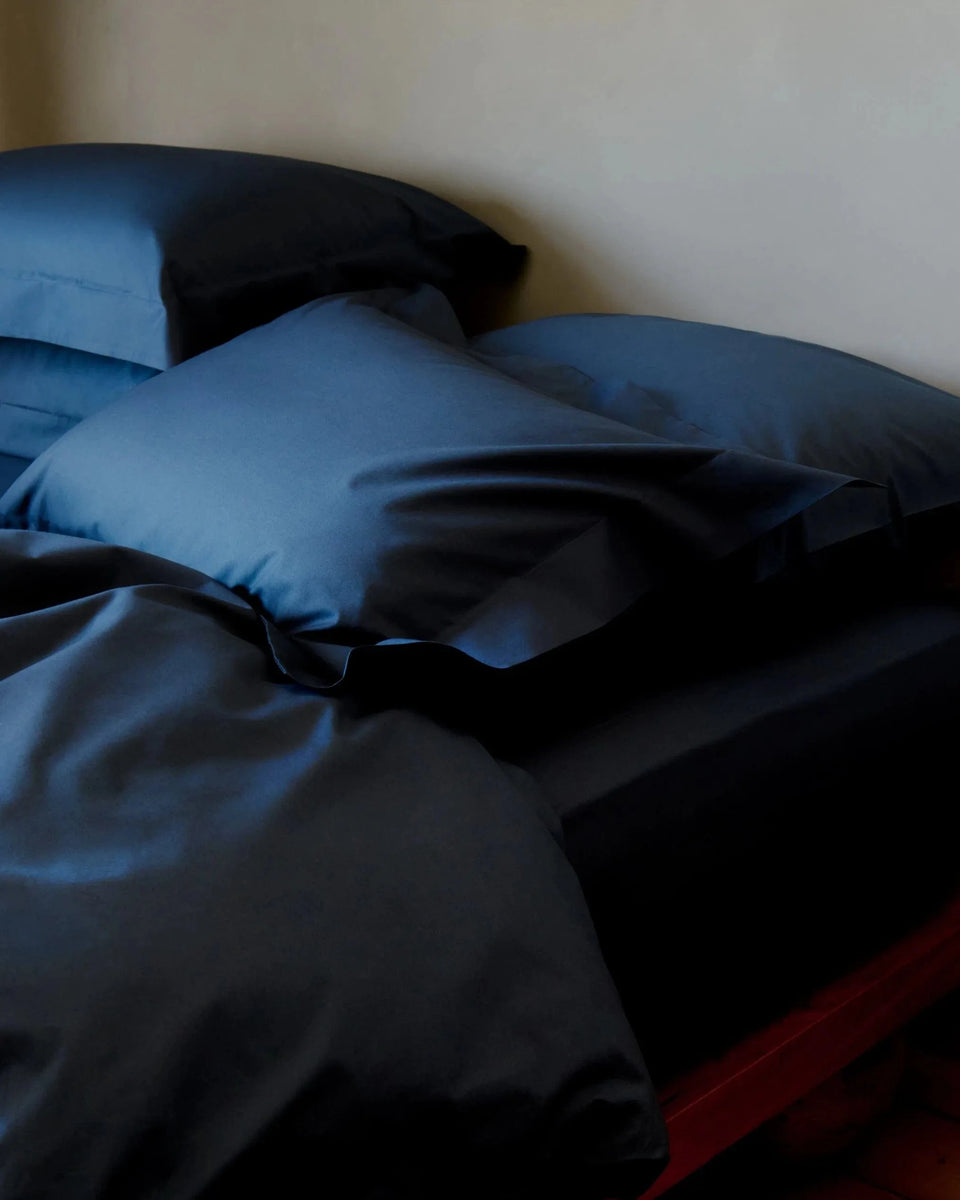 Image 4 of 4 showing Rise & Fall's Soft & Smooth organic sateen cotton comforter set, colour: indigo, size: twin.