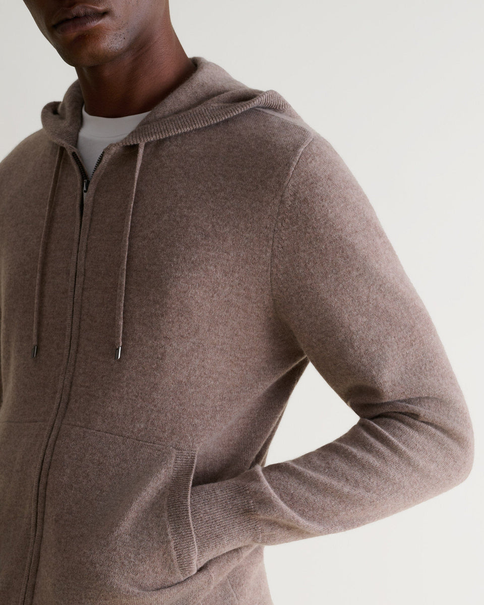 Image 4 of 5 showing man wearing Rise & Fall's fine cashmere zip hoodie, toast.