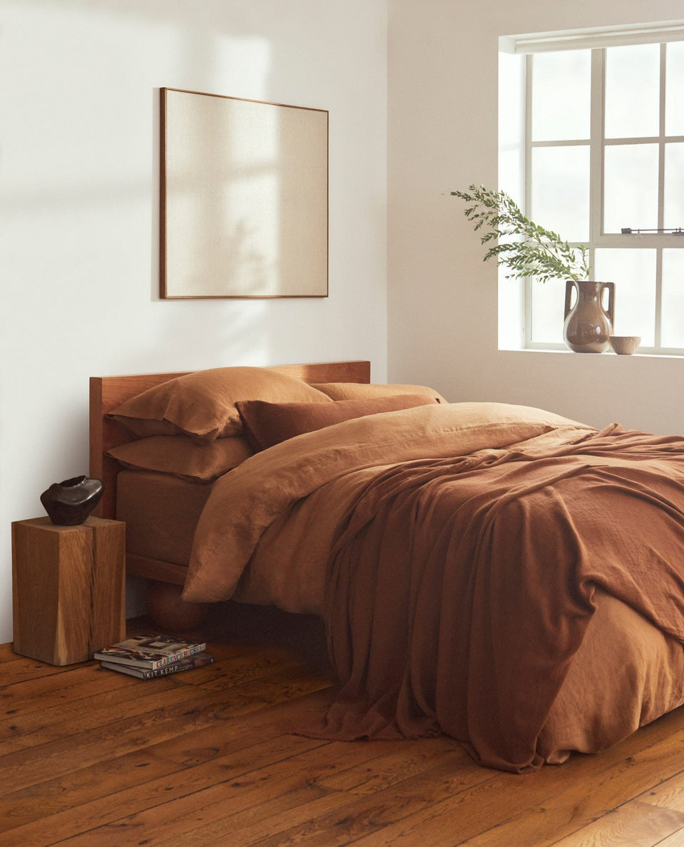 image 4 of 6 showing bed with Rise & Fall's Relaxed & Refined linen duvet set, fabric: European flax, colour: ochre