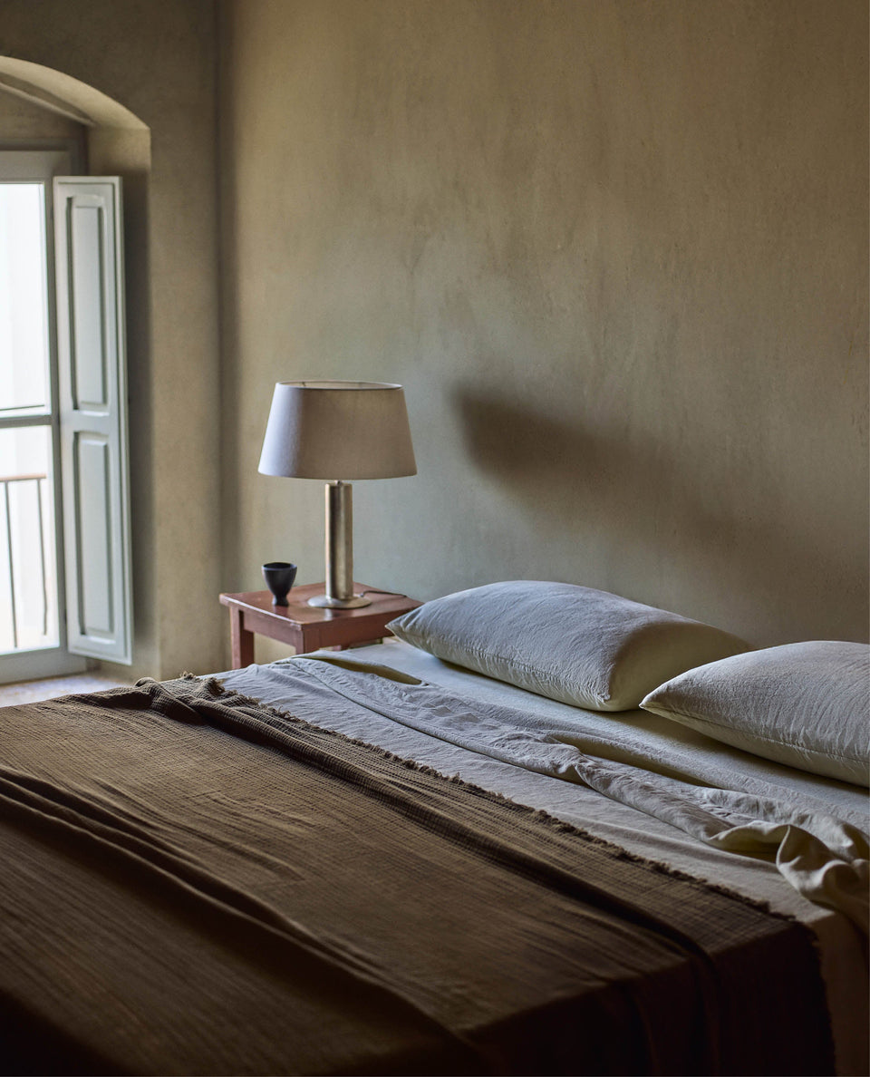 Image 4 of 6 showing Rise & Fall's House of Grey linen duvet set in peach.