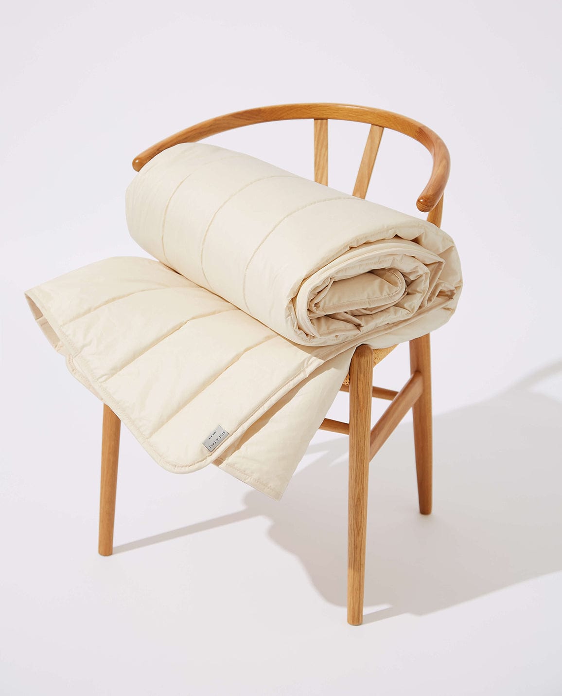 Image 5 of 5 showing Rise & Fall's certified British Wool Mattress Protector.