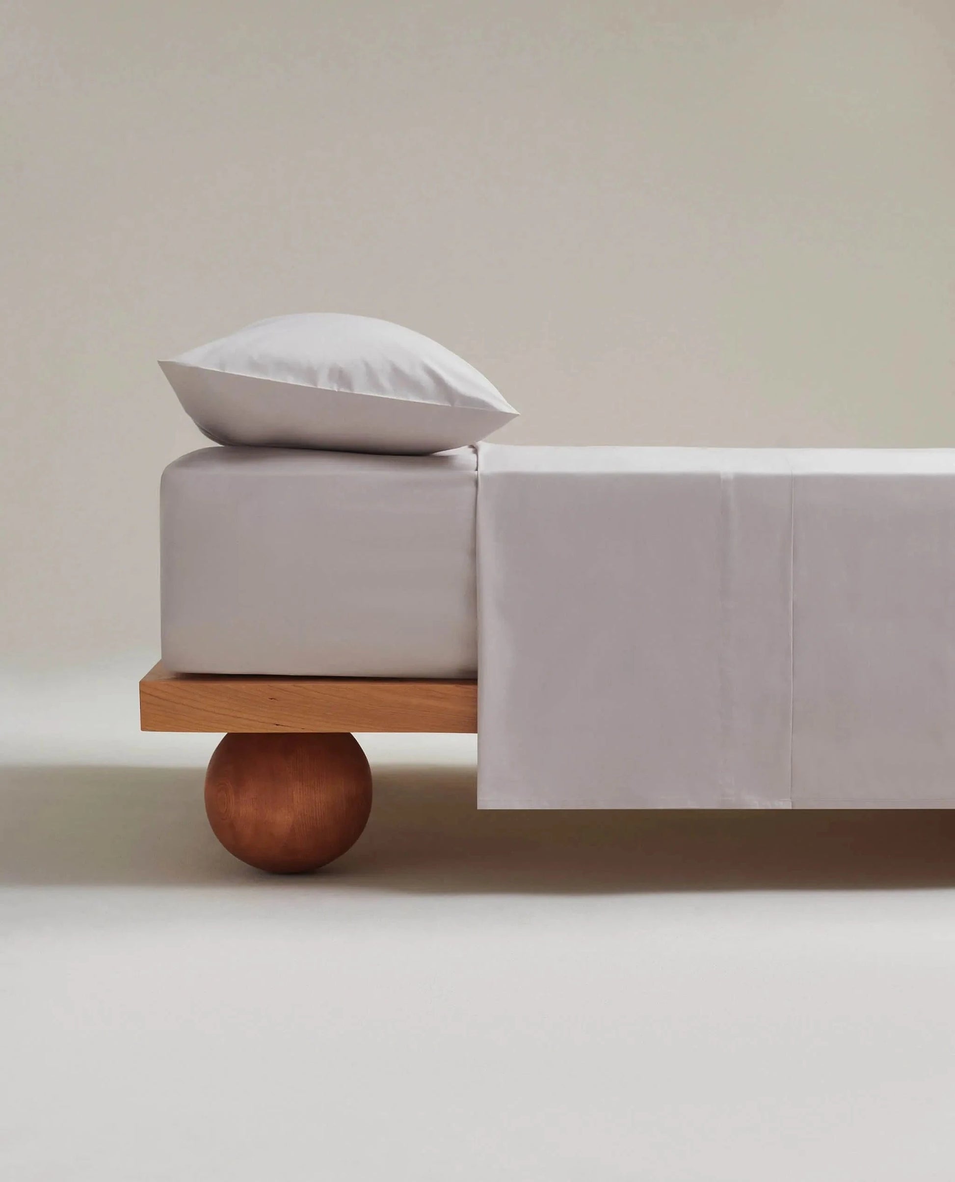 Image 5 of 5 showing Rise & Fall's Crisp & Cool organic cotton deep fitted sheet in pebble.