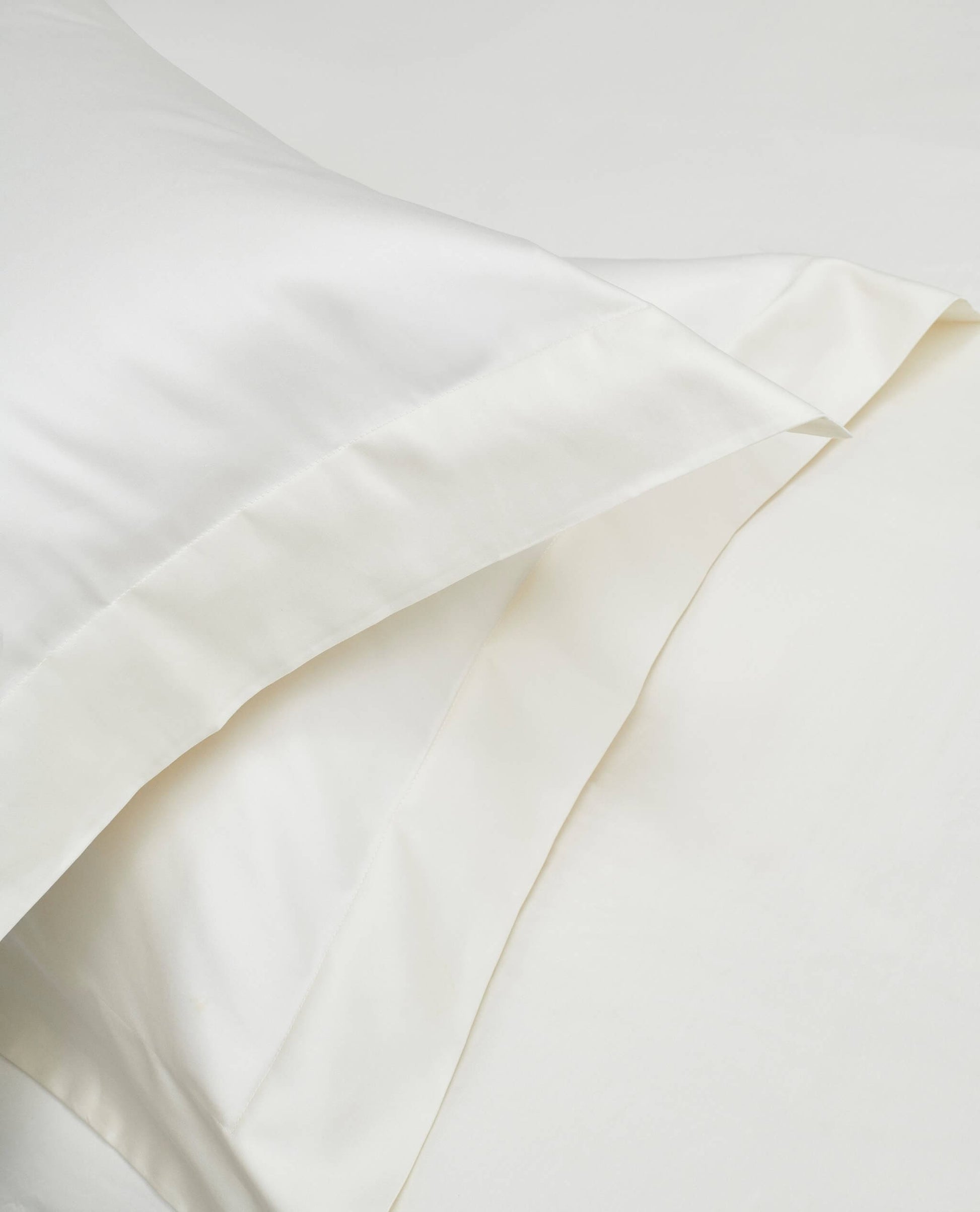 Image 5 of 6 showing Rise & Fall's Soft & Smooth Sateen Cotton Pillowcases, set of 4, colour: Buttermilk.