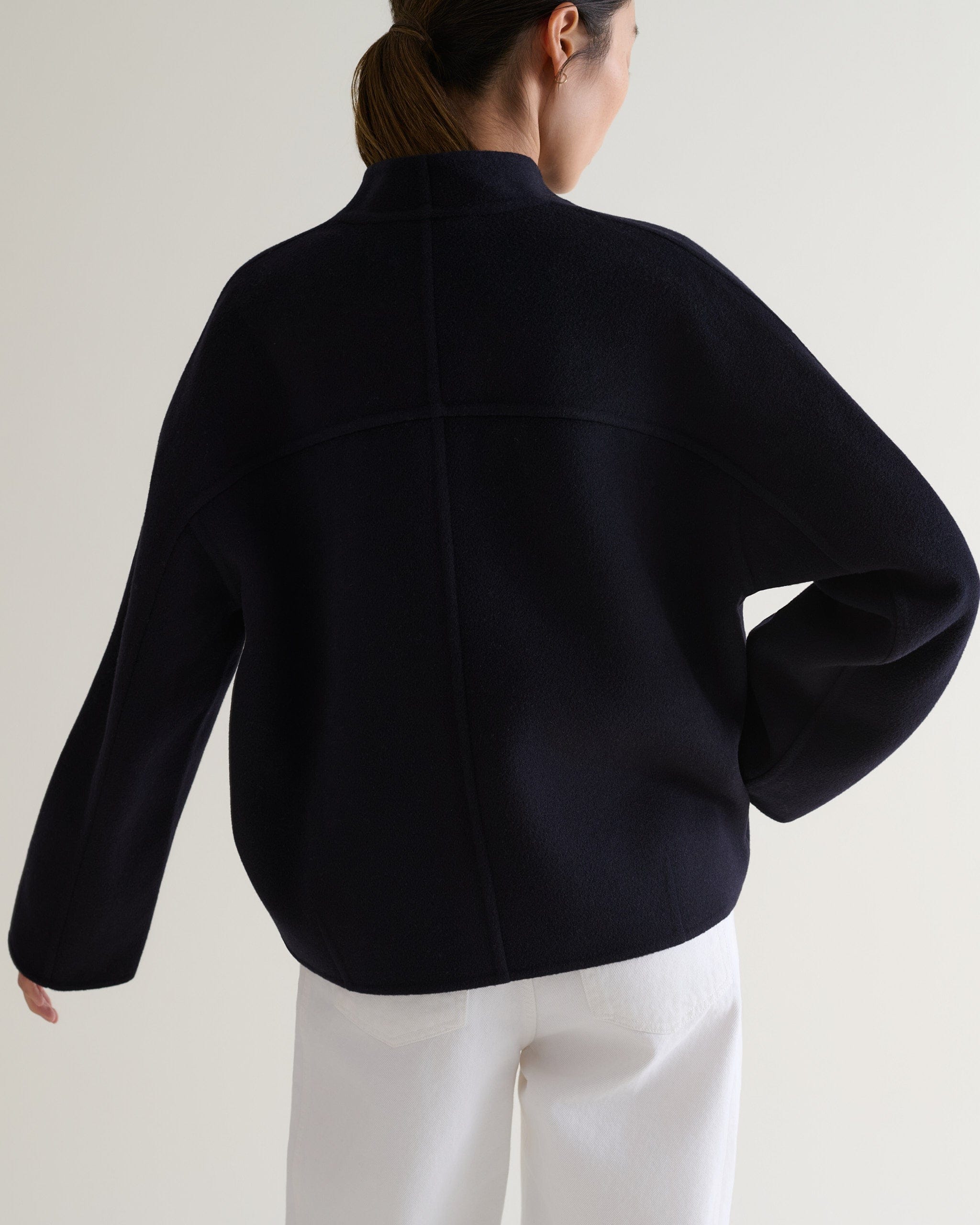 Curved, sculptural sleeves