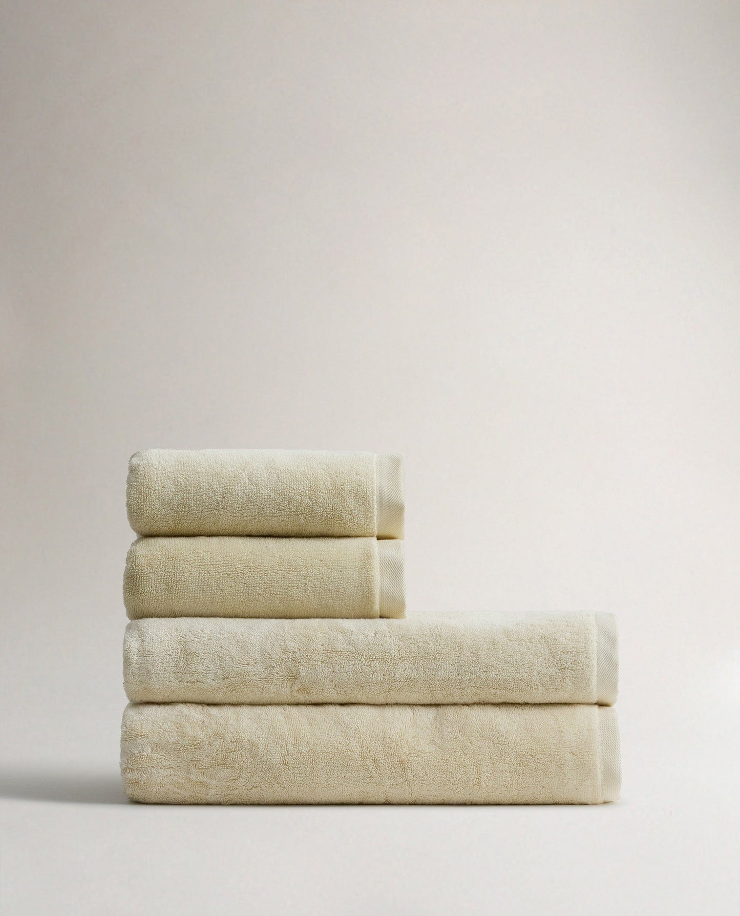 Side view of Rise & Fall's buttermilk Turkish Aegean cotton bath sheets