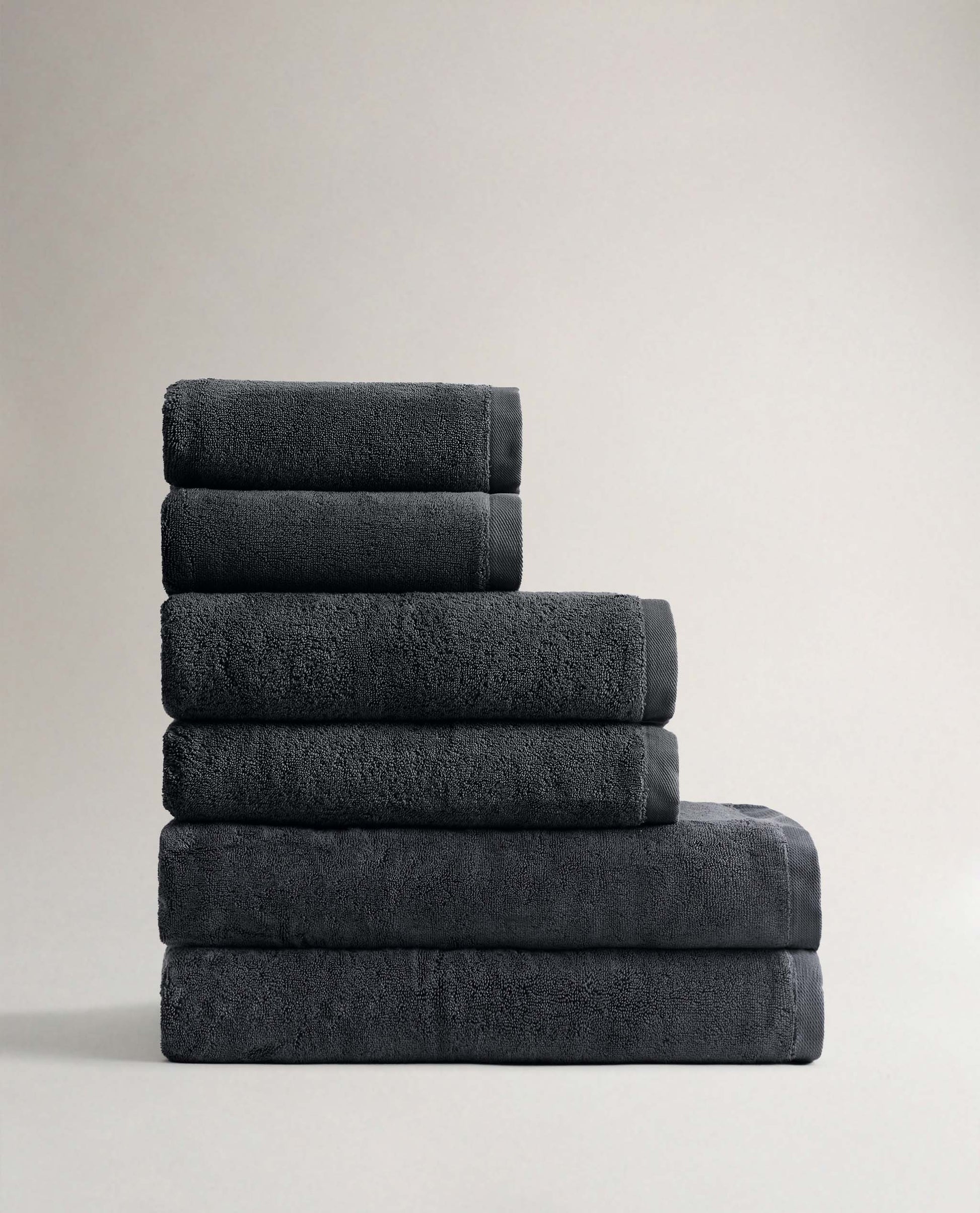 Side view of Rise & Fall's charcoal Turkish Aegean cotton bath sheets
