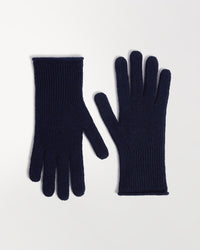 Close up of Rise & Fall's indigio cashmere merino ribbed gloves