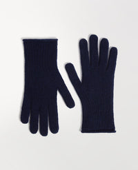 Close up of Rise & Fall's indigio cashmere merino ribbed gloves