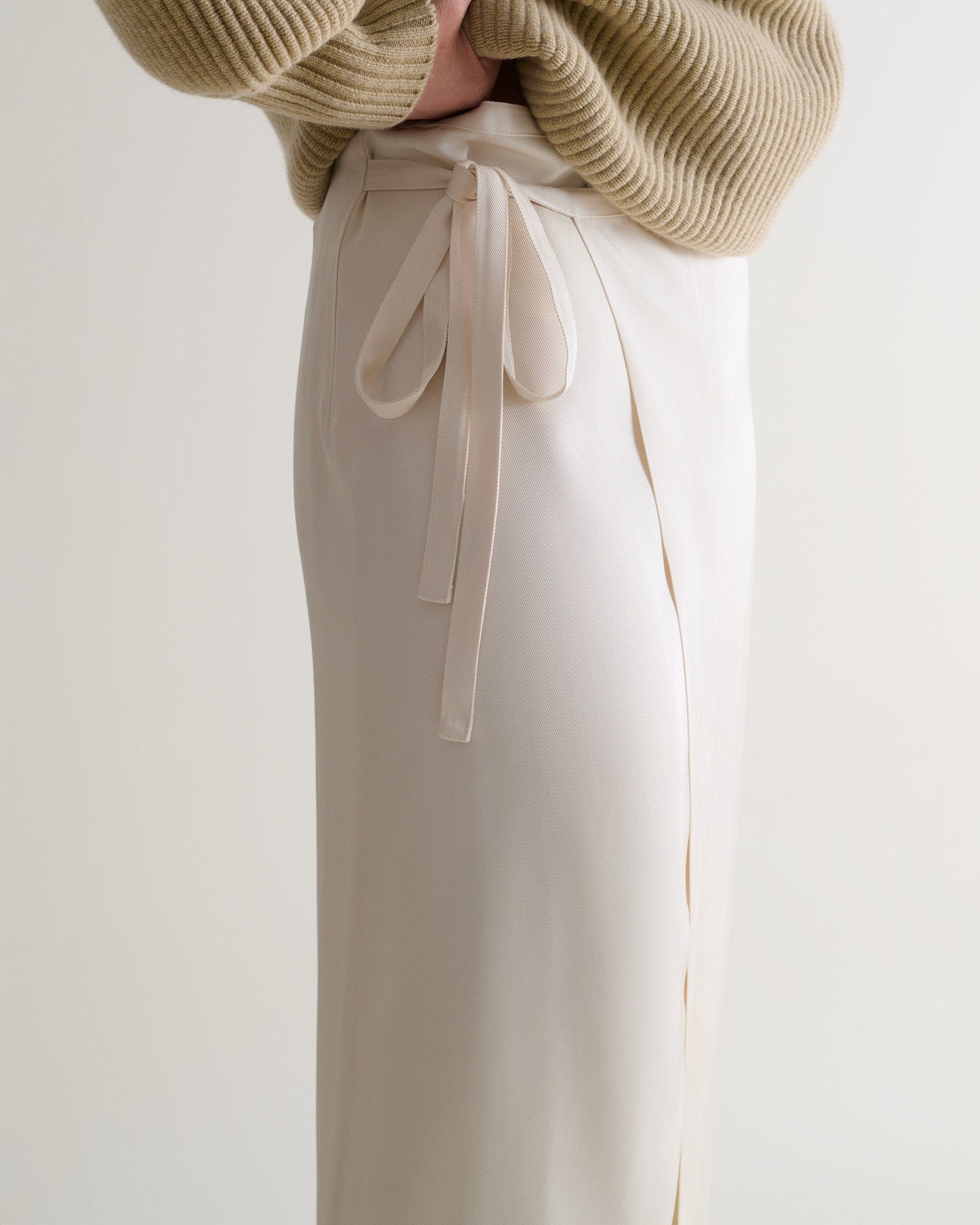 Rise & Fall's Naia™ midi wrap skirt in alabaster. 