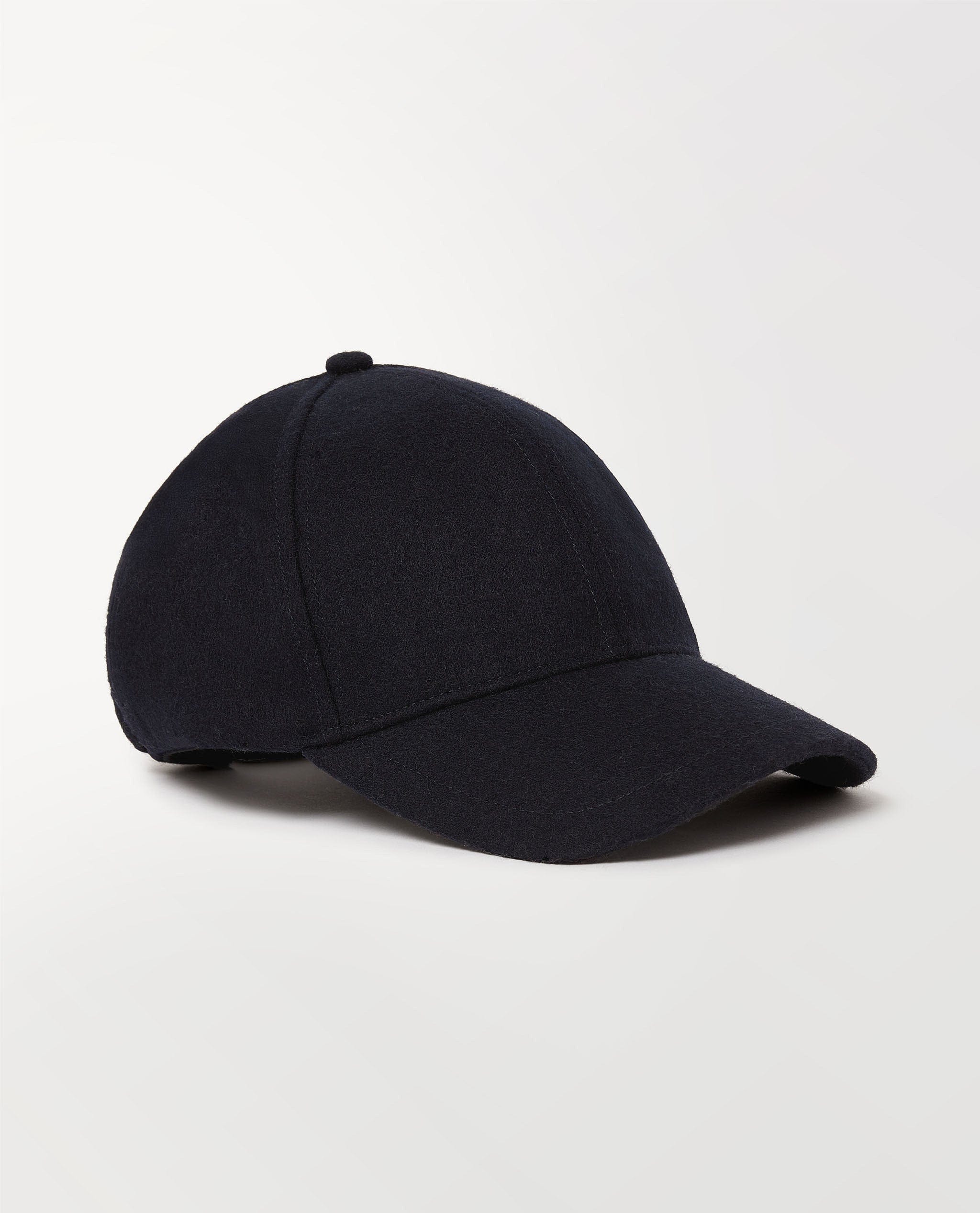 Close up of Rise & Fall's navy cashmere merino wool baseball cap.