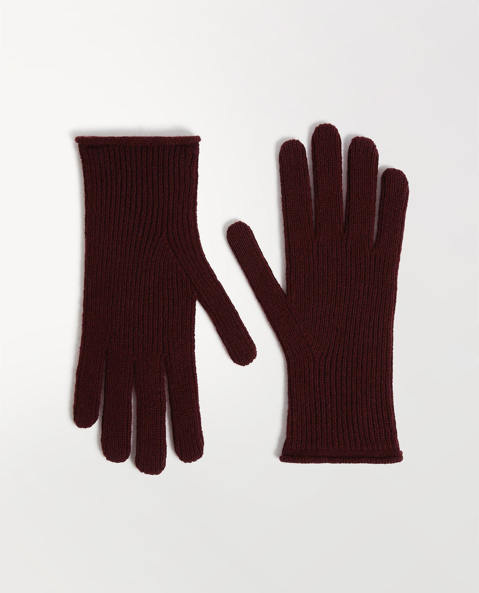 Close up of Rise & Fall's oxblood cashmere merino ribbed gloves