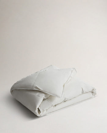 Folded Rise & Fall's Recycled Down Duvet.