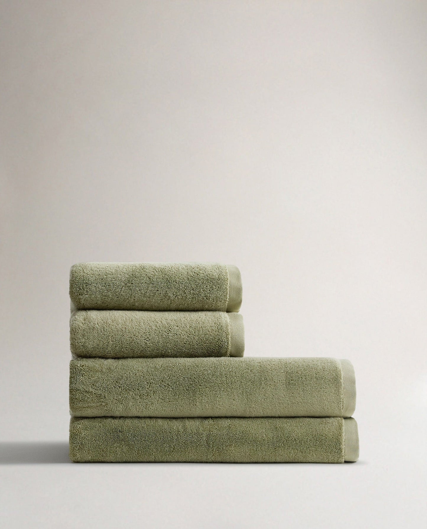 Side view of Rise & Fall's sage Turkish Aegean cotton bath sheets