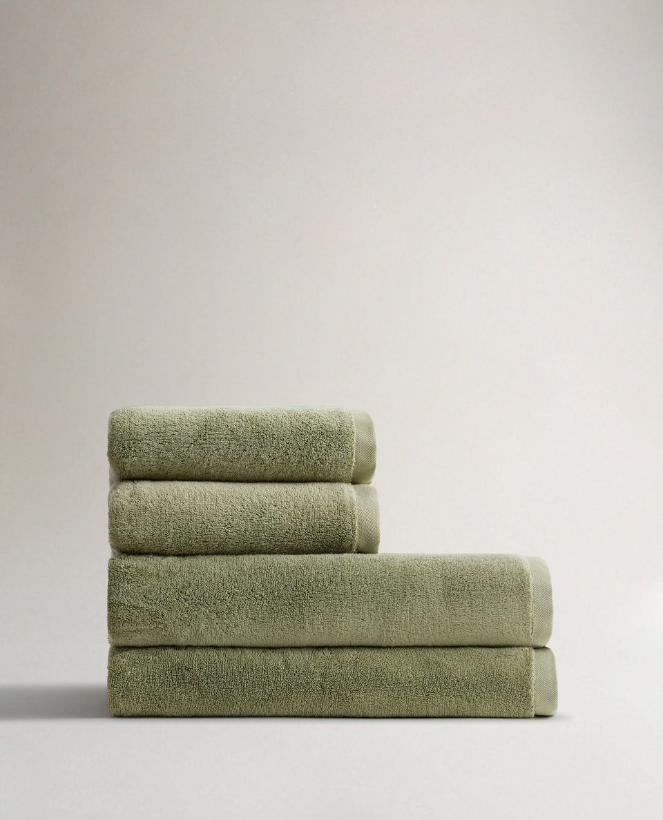 Side view of Rise & Fall's sage Turkish Aegean cotton bath sheets