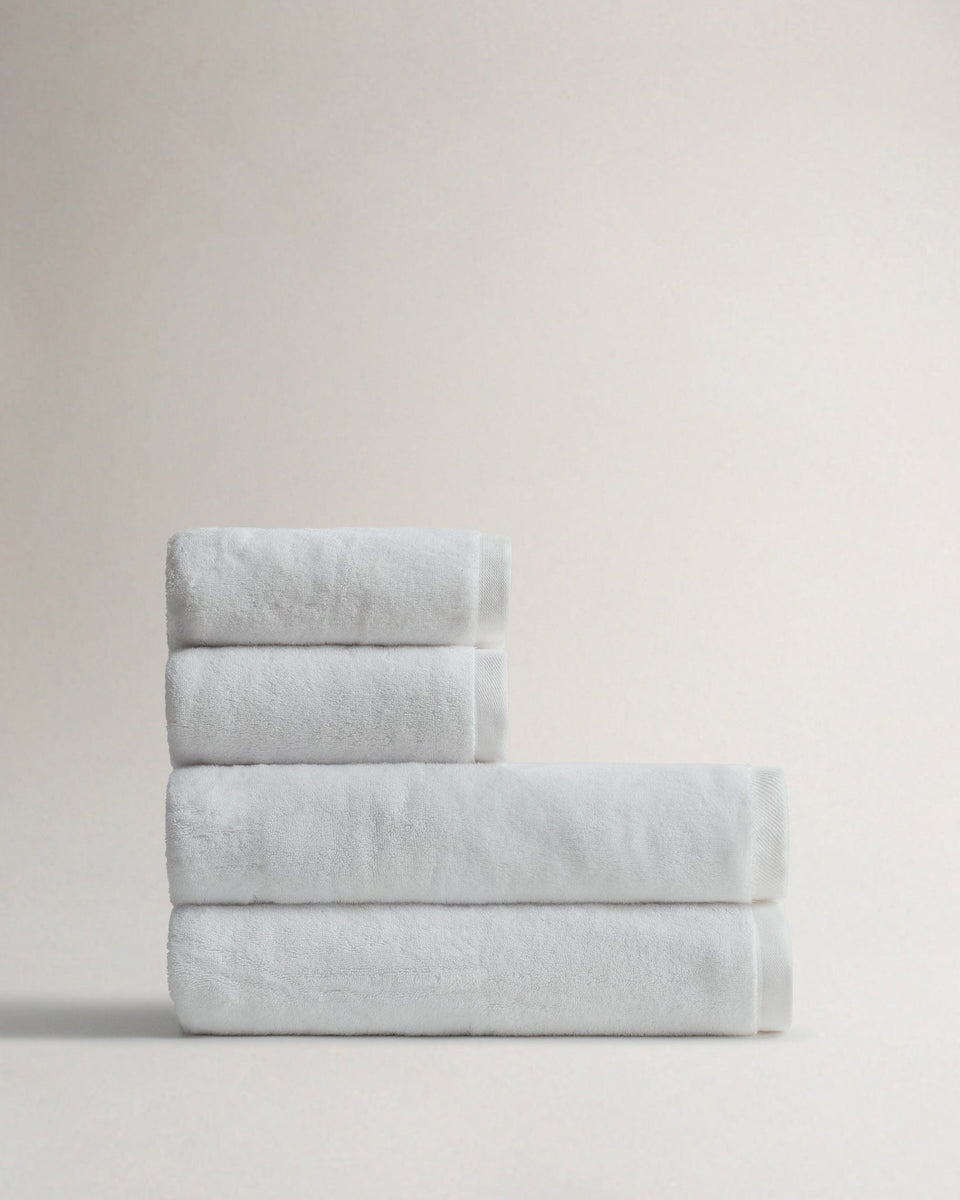 Side view of Rise & Fall's white Turkish Aegean cotton bath sheets