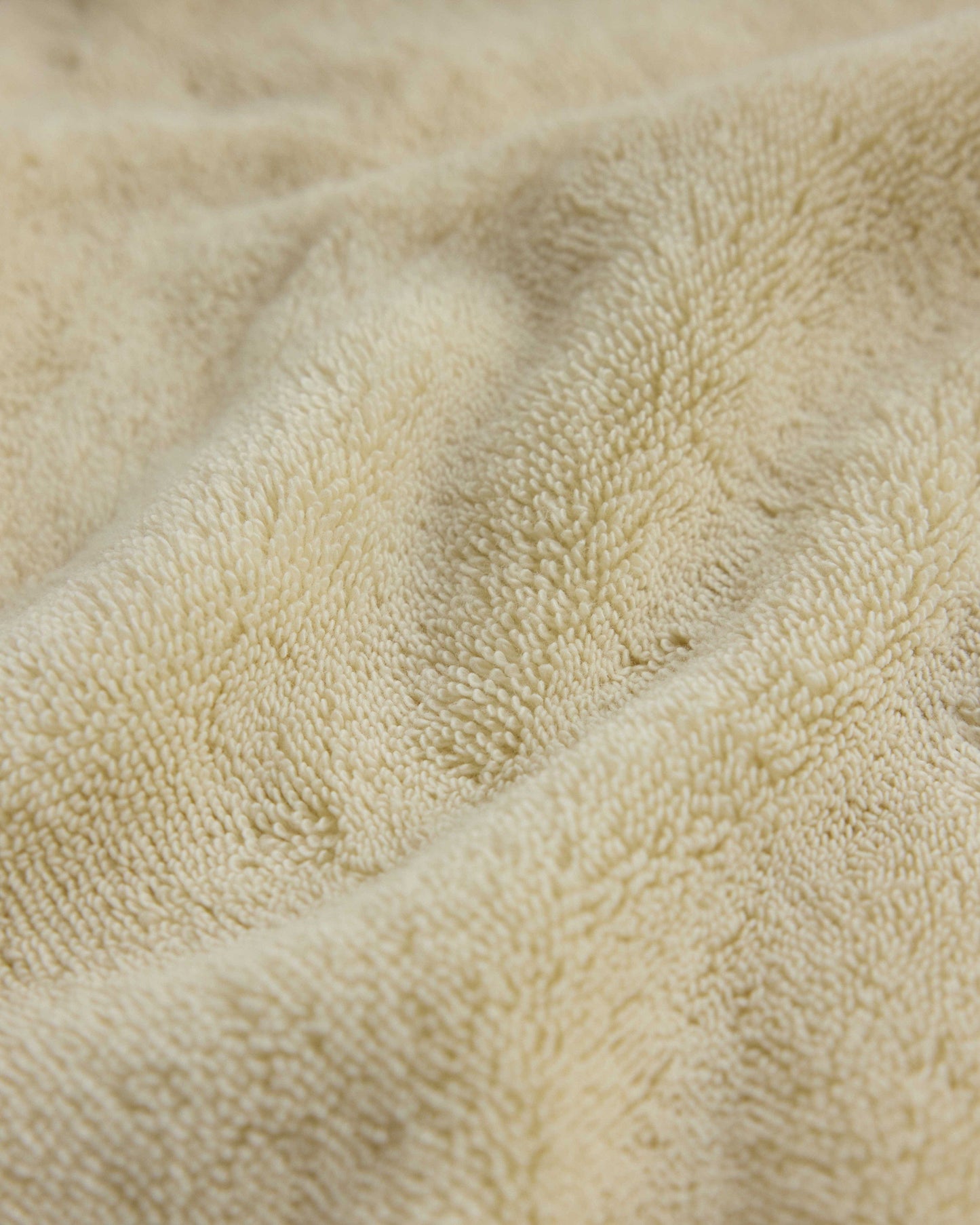 Close up of Rise & Fall's buttermilk Turkish Aegean cotton bath sheets